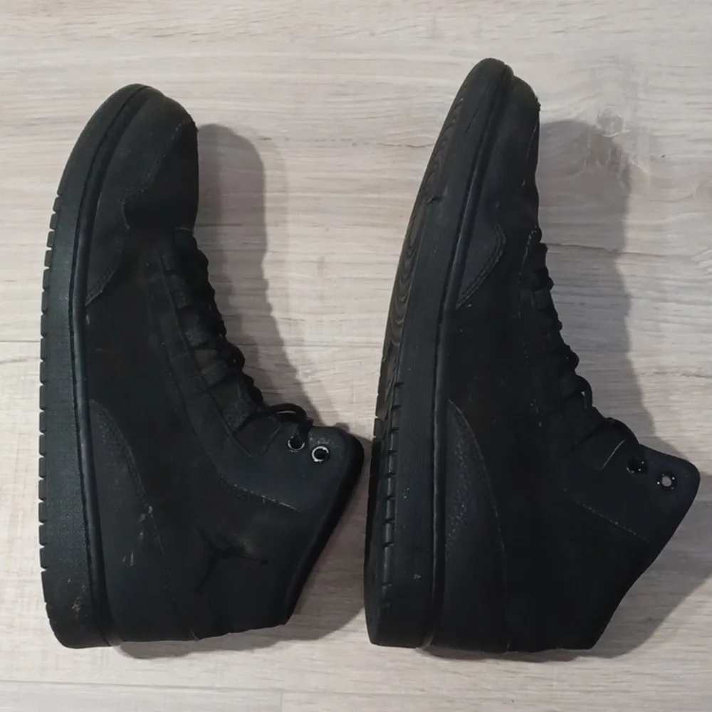AIR JORDAN EXECUTIVE black sneakers.  Black mid top gym shoes.  Athleisure Urban
